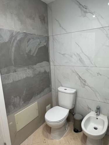 Moradia T3 Renovada no Centro de Parchal - Conforto, Estilo e Localização Privilegiada!