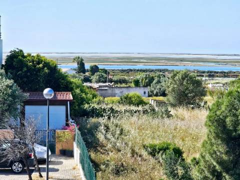 Moradia Moderna com Vista para a Ria Formosa e Rooftop Panorâmico
