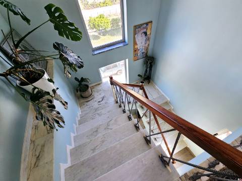 Moradia Moderna com Vista para a Ria Formosa e Rooftop Panorâmico
